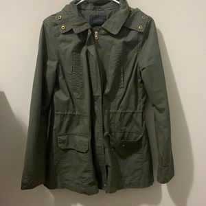 large green hooded coat